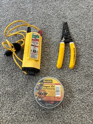 Ideal USA 61-065 AC/DC High Voltage Tester and a Pair of Klein wire strippers.