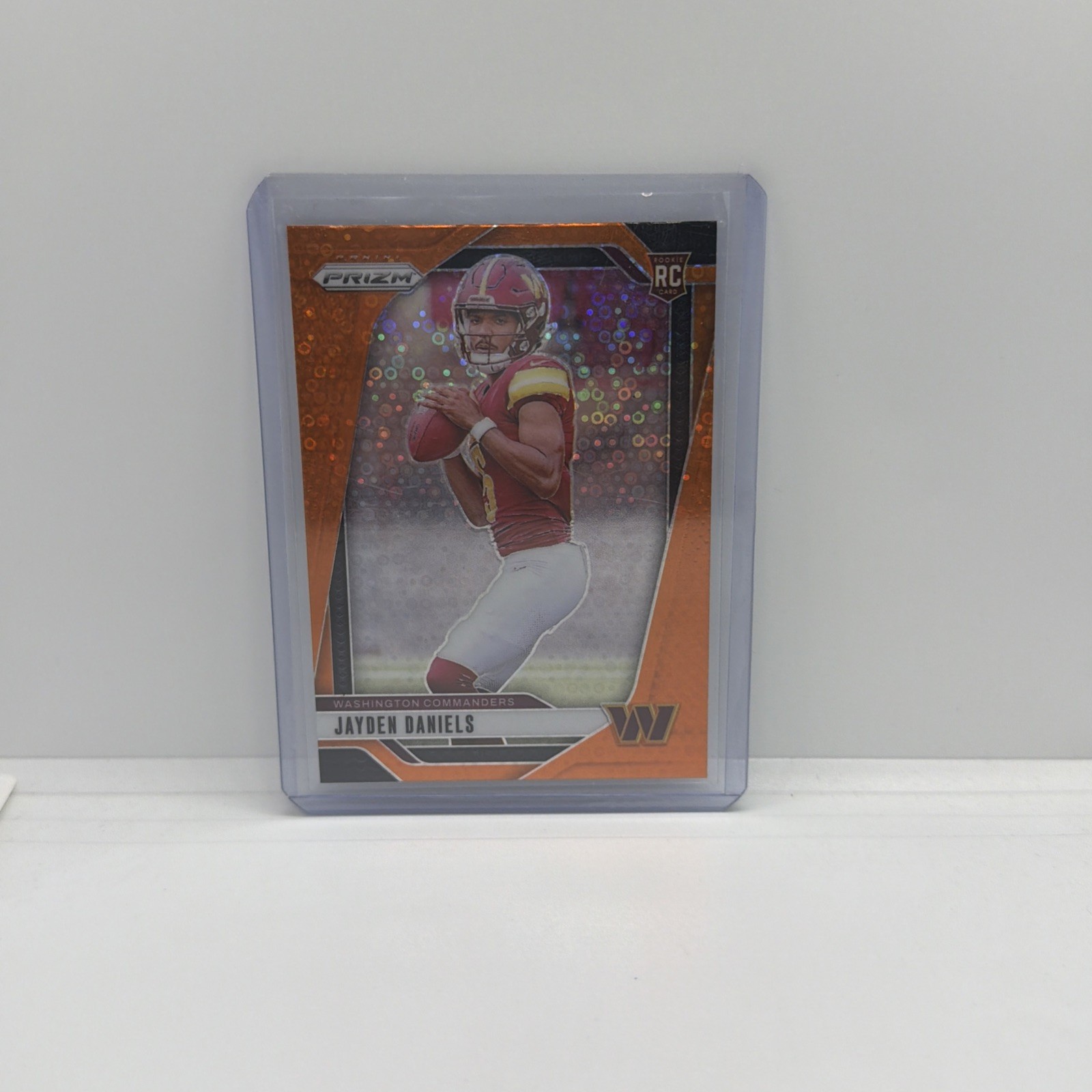 2024 Panini Prizm Jayden Daniels #347 Orange Disco Prizm (RC) SP Commanders