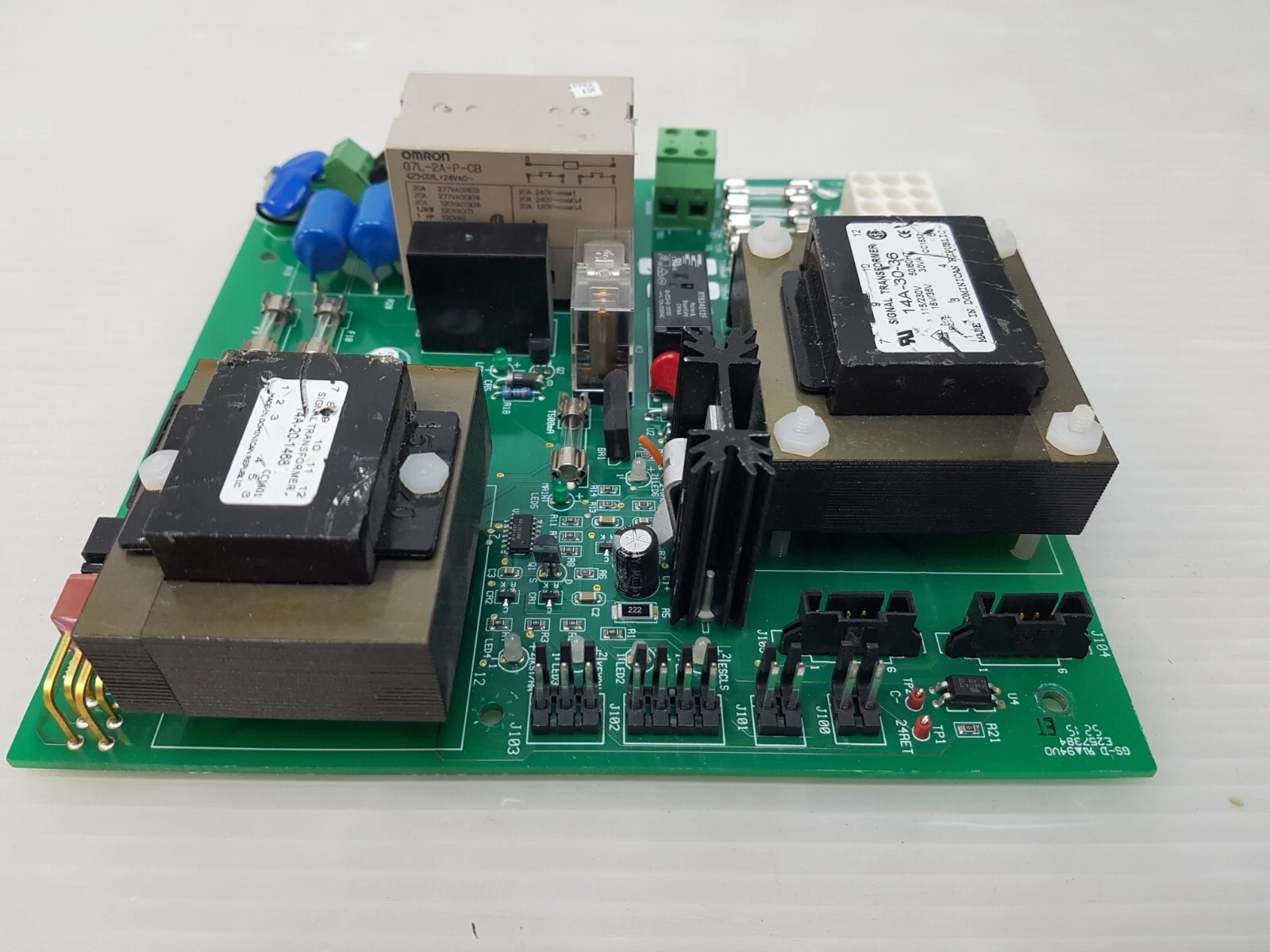 Close-up of the Omron G7L-2A-P-CB relay and the 14A-20-1468A and 14A-30-36 transformers