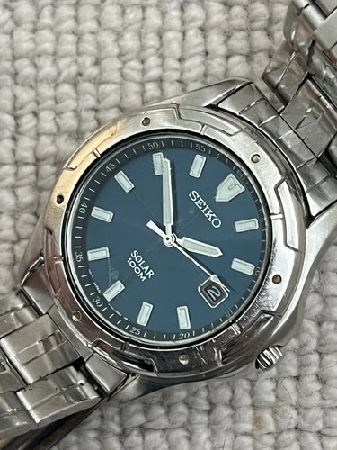 Seiko Solar Mens Blue Silver Vintage Watch 39mm Date 100M V145-0AC0