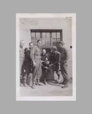WW2 Photo U.S. Group GIs Standing By Building Windows Germany