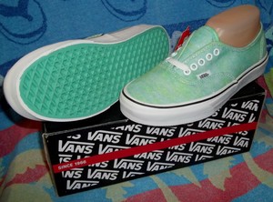 mint green checkerboard vans