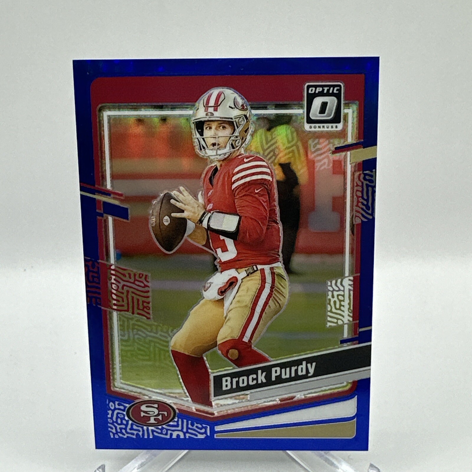 2023 Panini Donruss Optic - #168 Blue Prizm Brock Purdy /199 49ers