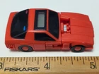 Takara Vintage 1984 micro 2-inch car-to-robot transformer (unidentified)