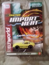 AUTO WORLD 1973 DATSUN 240Z Import heat Extraction HO Slot Car NOS