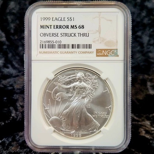 1999 $1 1 oz American Silver Eagle NGC MS68 Mint Error Obverse Struck Thru