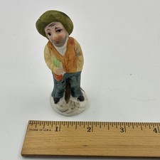 Ceramic Man Figurine 3 in Painted Green Hat Holding Orange Carrot People