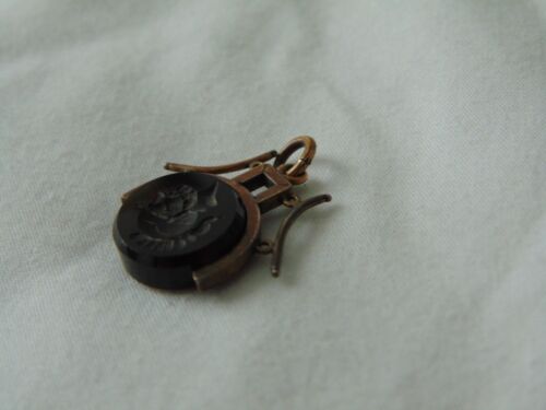 antique watch fob gold filled black onyx intaglio spinner