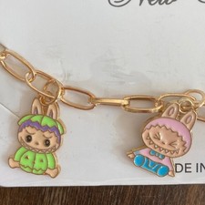 Monster Charm Bracelet w/ multiple little monster charms in colorful outfits New