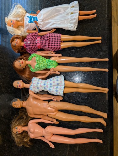 Mixed lot of 6 dolls total  Barbie, Ken, and one Disney/Burroughs marked doll