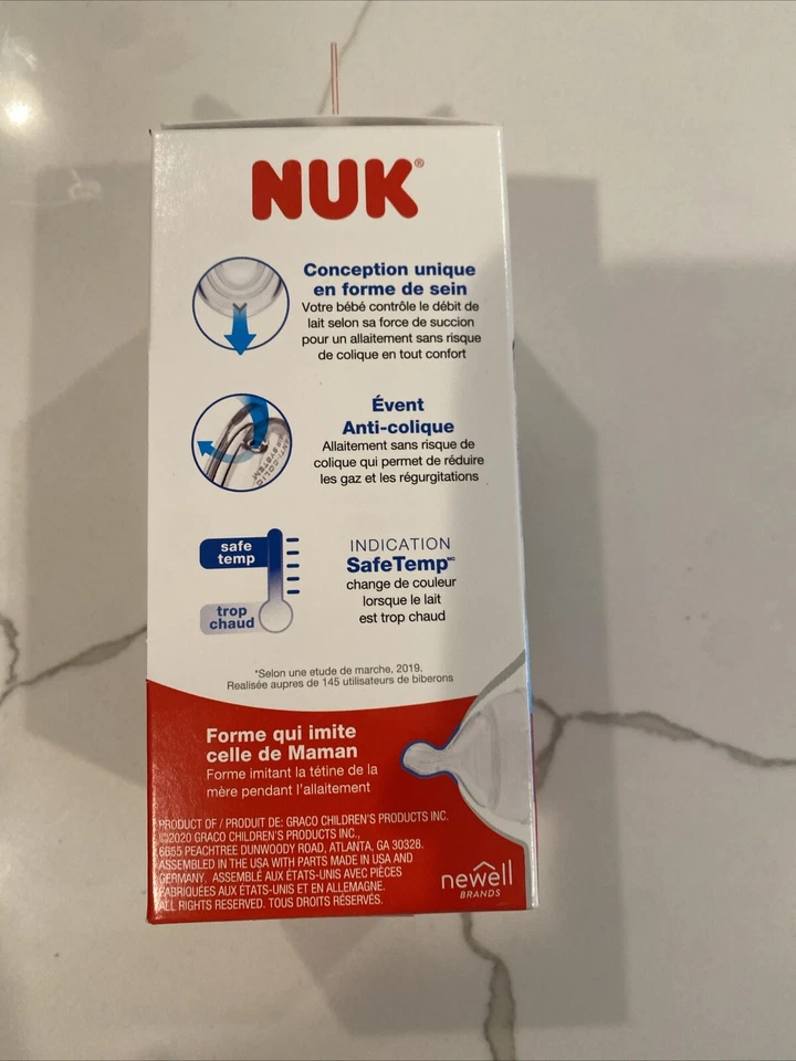 Botella anticólicos de flujo suave NUK, 5 oz. Indicador de temperatura seguro. Silicona 0+mes Foto 2 de 4