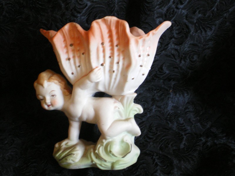 HAND PAINTED PORCELAIN CHERUB W/FLOWER ON HER BACK