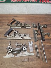 K668- Antique STANLEY No. 45 combination plane parts lot