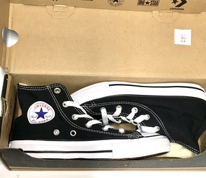 black converse with yellow laces