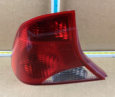 2002-2004 Ford Focus Sedan Rear Left Driver Side Tail Light W Sockets Oem. 2002-2004 Ford Focus Sedan Rear Left Driver Side Tail Light W Sockets Oem.