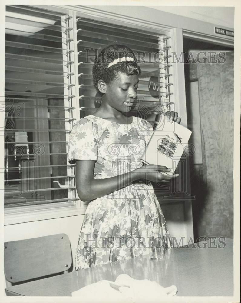 1964 Press Photo Phlisena West holds book at school - lra62722