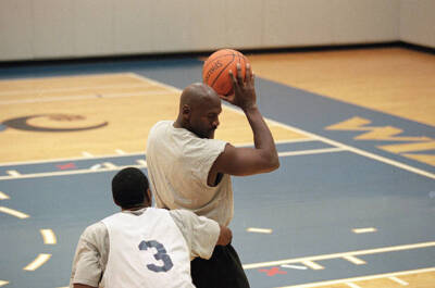Washington Wizards executive Michael Jordan with Laron Profit duri- Old Photo 1
