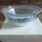 Pyrex "Blue Floral Ribbon" clear glass nesting mixing bowl set.