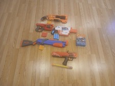 nerf gun collection         many attachments and ammo plenty for the kids.