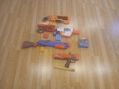 nerf gun collection!!     many attachments and ammo! plenty for the kids.
