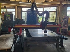 CNC Plasma Cutter. Torit Fume Extractor. Koike Aronson Table. Hypertherm Plasma.