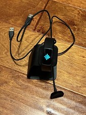 FitBit Charge 5, With Charger stand stuck on fitbit logo needs repair or...