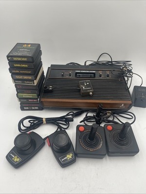 Atari CX-2600A  Video Console Bundle w/ 11 Games 2 Paddles 2 Joysticks UNTESTED