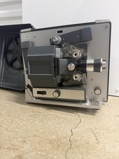 Vintage Bell  Howell Autoload film projector in very nice cosmetic condition.