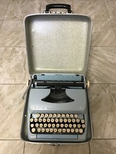 Refurbished Vintage 1950s Baby Blue Smith Corona “Tower” Portable Typewriter thumbnail