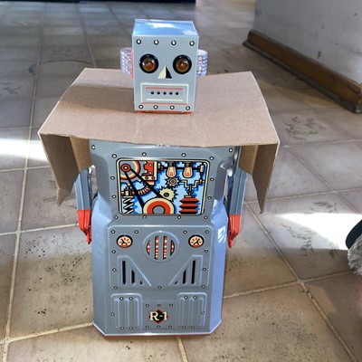 Robot R-1 Rocket USA Battery-Powered Bump-&-Go Action with Lights (2000)