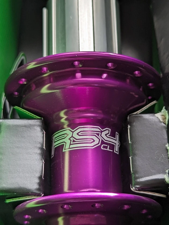 Buje trasero Hope RS4 142/12 mm bloqueo central disco CL carretera púrpura Shimano HG11 28h Foto 2 de 4