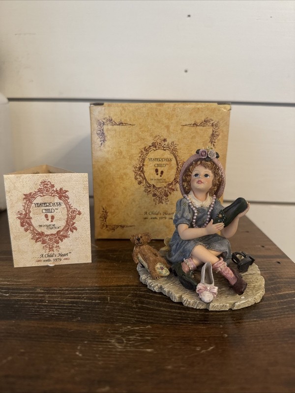 Yesterday’s' Child Dollstone Collection Filling Momma's Shoe. Retired