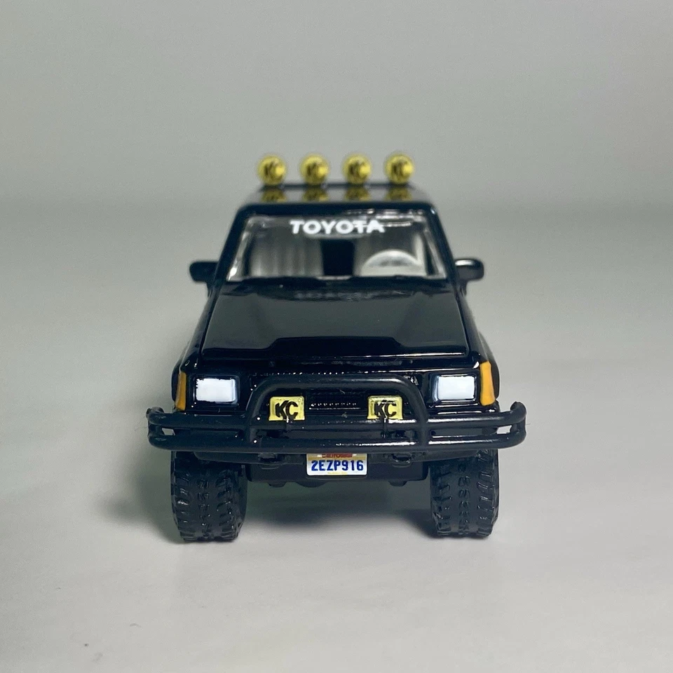 Johnny Lightning 1985 Toyota SR5 Pickup Back To The Future 1:64 Diecast Black - Image 2 of 4