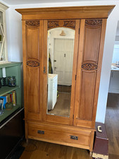 Vintage wardrobe, solid wood with decorative carving, bottom drawer.