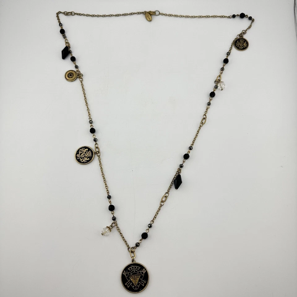 "Collar estación cuentas acrílico negro esmalte negro tono dorado Guess 32""" Foto 3 de 4