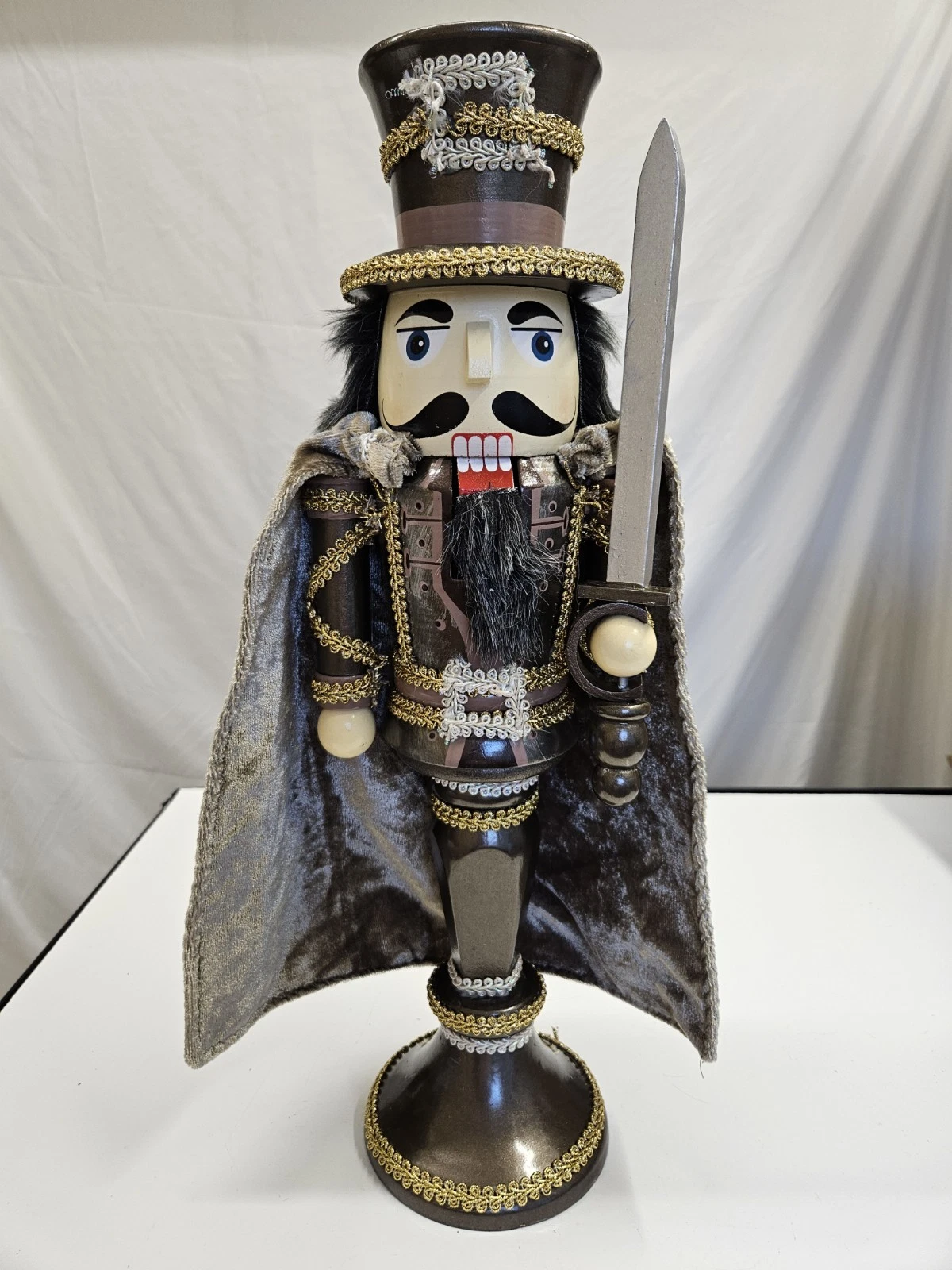 Pedestal Wooden Nutcracker with Sword Brown Velvet Cape 18" Gold Trim