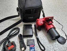 Canon PowerShot SX400 IS 16.0MP Digital Camera-Red with Camera Bag