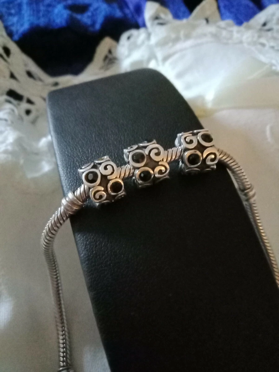 Slidable leather store charm bracelet