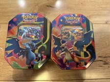 Pokemon Mega Charizard -Set of 2- Tins Sealed In Hand