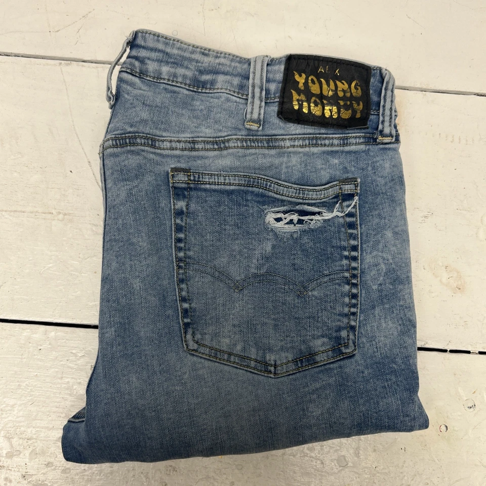 Pantalones de mezclilla American Eagle X Young Money apilados lavados con ácido 38x32 ajustados desgastados Foto 2 de 4