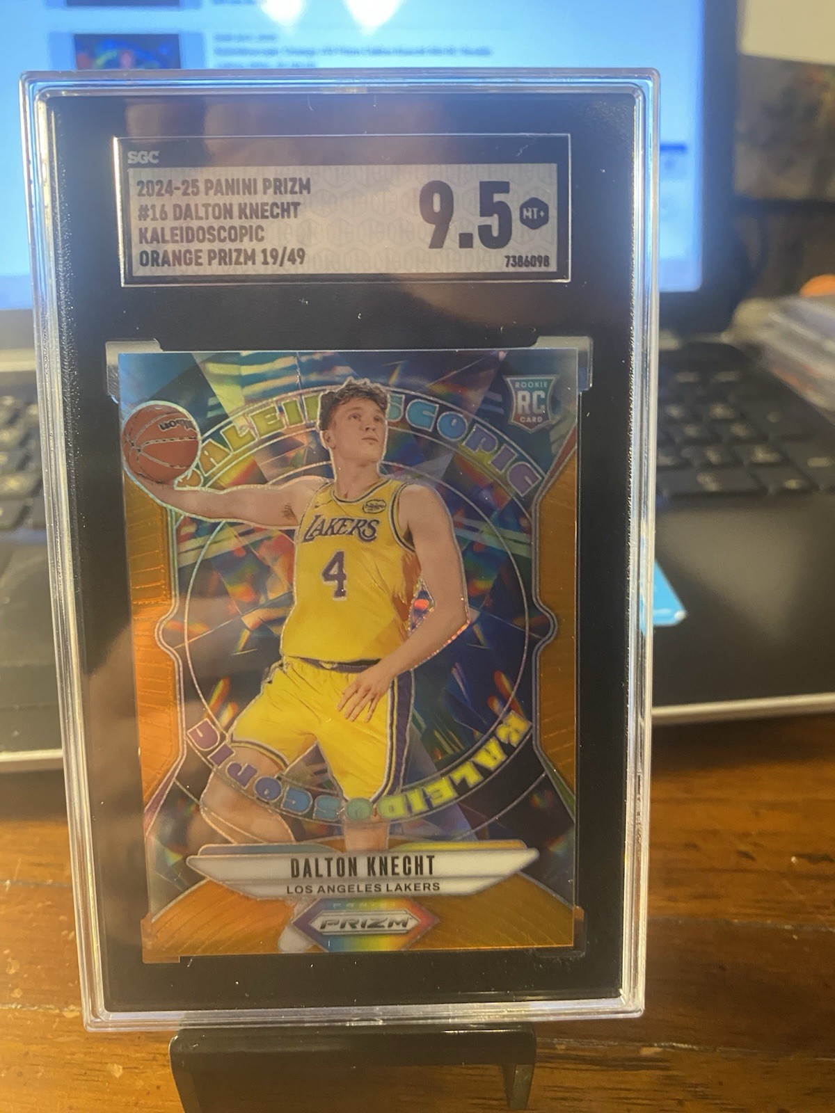 2024-25 Panini Prizm - Kaleidoscopic Dalton Knecht #16 Orange Prizm /49 (RC)