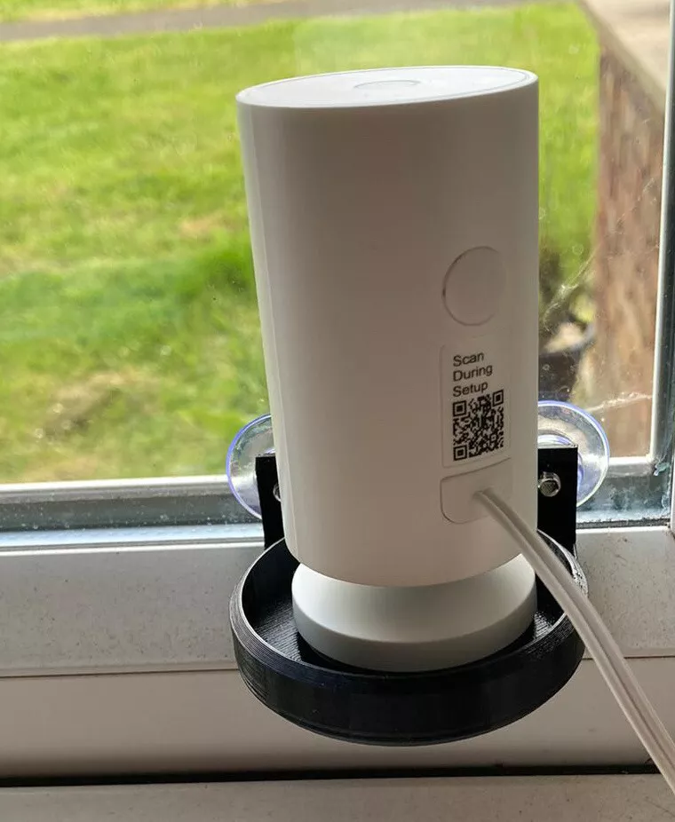 Stick on store window camera