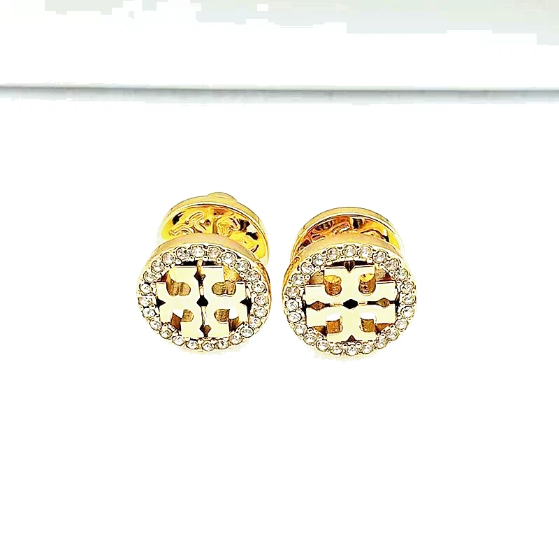 Pendientes de oro redondeado Tory Burch Foto 2 de 3