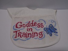 Goddess In Training Baby Bib Cotton Needlework has some faint staining on back
