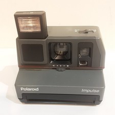 VINTAGE POLAROID IMPULSE CAMERA WITH BUILT IN FLASH AND STRAP UNTESTED