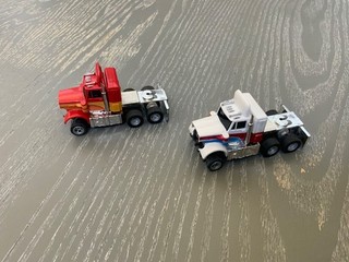 2 semirremolques vintage Aurora AFX Peterbilt escala HO coche ranurado rojo blanco como se encuentra