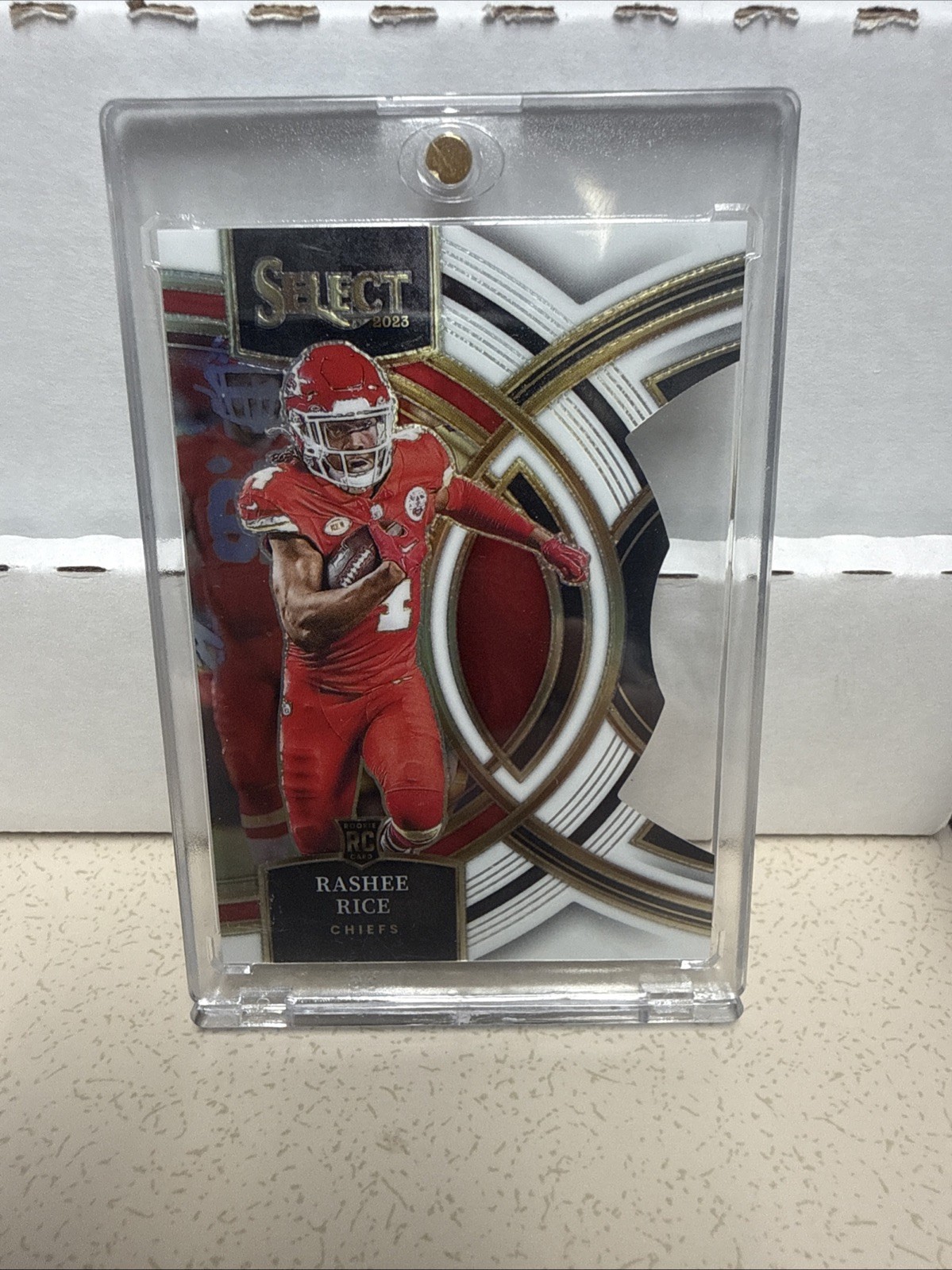 2023 Panini Select Premier Level Rashee Rice #132 White Prizm Die-Cut /199 (RC)