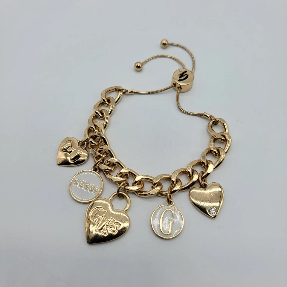 Pulsera Guess Mujer Corazón Dije Tono Dorado Longitud Ajustable Foto 2 de 4