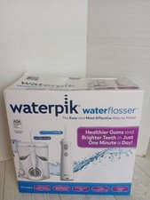 NEW Waterpik Ultra Plus Cordless Pearl Water Flosser Combo Pack Factory Sealed