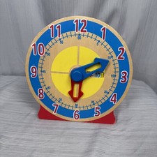 Melissa  Doug Wooden Turn and Tell Clock Toy, No Cards
